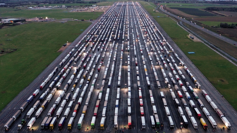Lines of freight lorries and heavy goods vehicles parked at Manston Airport near Ramsgate