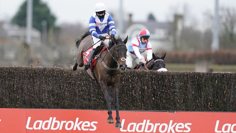 Bryony Frost and Frodon safely negotiate the final fence at Kempton