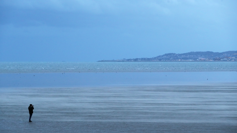 A man on Sandymount Strand as the wind picks up as Storm Bella approached at the weekend