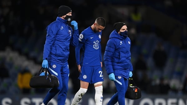 Ziyech leaves the pitch following an injury during the Premier League match against Leeds
