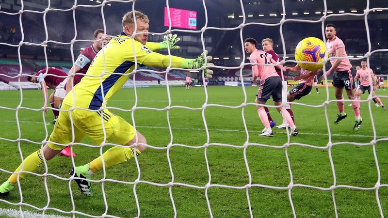Ben Mee scores past Sheffield United's English goalkeeper Aaron Ramsdale