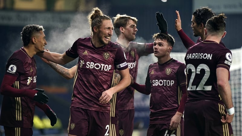 Raphinha celebrates his goal with teammates Luke Ayling, Patrick Bamford, Jamie Shackleton, and Jack Harrison