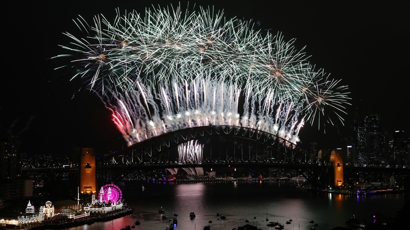 In Australia's largest city, Sydney, fireworks lit up the glittering harbour with a dazzling display, but few spectators watched in person