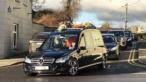 The hearse bearing the coffin, which was draped in the tri-colour, was driven through Blackrock village, Co Louth