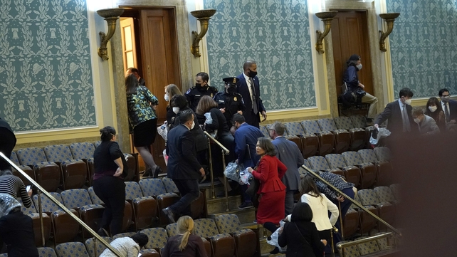 Members of the House of Representatives were evacuated while events escalated outside