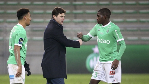 Mauricio Pochettino fist bumps Lucas Gourna-Douath of Saint-Etienne