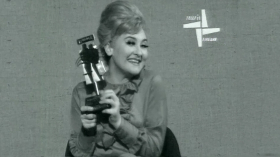 Bláithín Keaveney with 'Nighthawks' award, 1991.