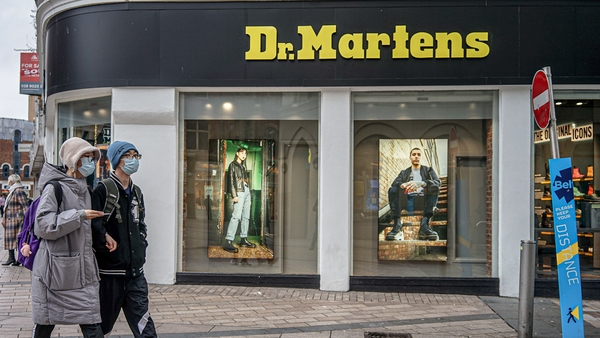 Dr Martens has posted a 22% rise in annual core earnings with online sales helping to soften the hit from Covid-19-related store closures