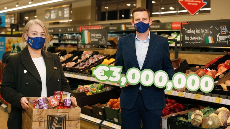 Deborah Crowley, Funky Monkey Foods, one of the Grow with Aldi 2020 winners, with John Curtin, Group Buying Director at Aldi Ireland