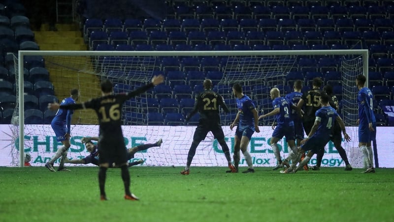 Craig Dawson scores what proved to be the winning goal in the cup tie at Edgeley Park