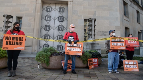 Demonstrators at the US Justice Department in Washington protest against federal executions of death row inmates