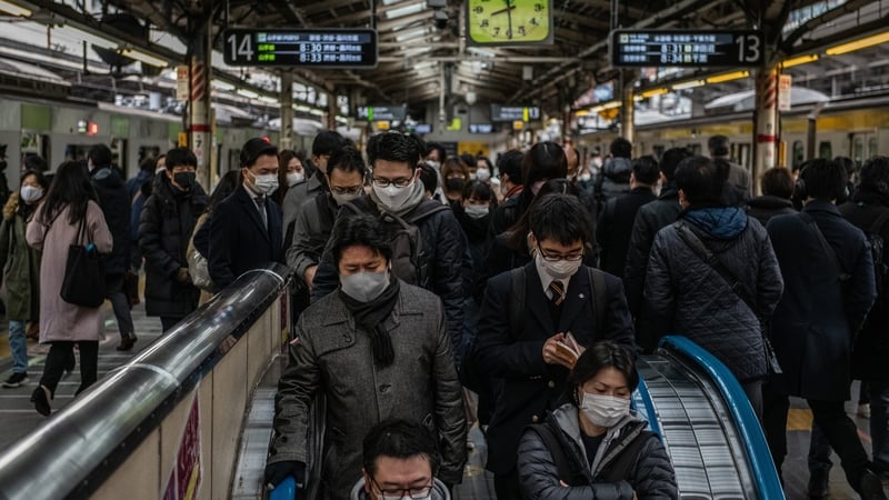 Japan's economy expanded at a slower than initially reported pace in the fourth quarter of 2020