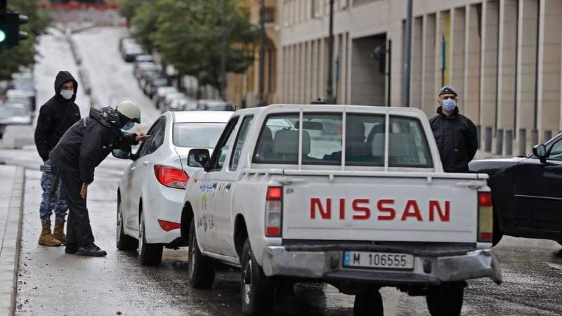 Policemen at a checkpoint in the the downtown district of Beirut