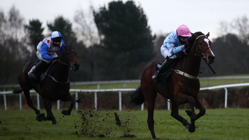 Paul O'Brien riding Eileendover (right) on their way to winning the Alan Swinbank Mares' Standard Open National Hunt Flat Race