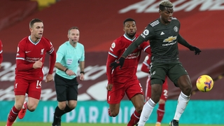 Paul Pogba gathers possession at Anfield
