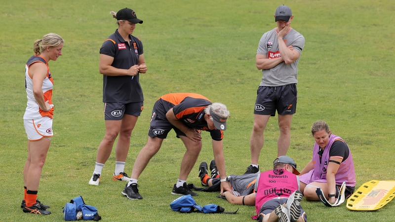 Bríd Stack is attended by medical staff following the collision with Ebony Marinoff