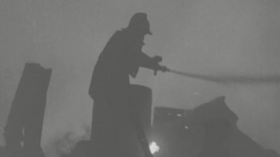 Fireman fighting blaze at Jefferson Smurfit factory, Walkinstown (1971)
