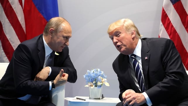 Vladimir Putin and President Donald Trump chat at the same summit
