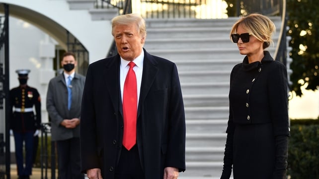 Donald Trump speaks to reporters before he and Melania leave the White House at the end of his presidency