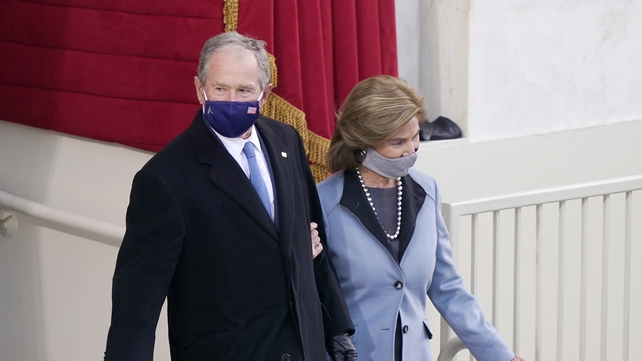 Former President George W Bush and Laura Bush arrive for the inauguration