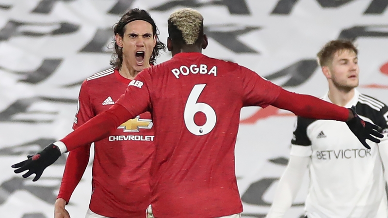 Edinson Cavani celebrates his equaliser against Fulham with Paul Pogba