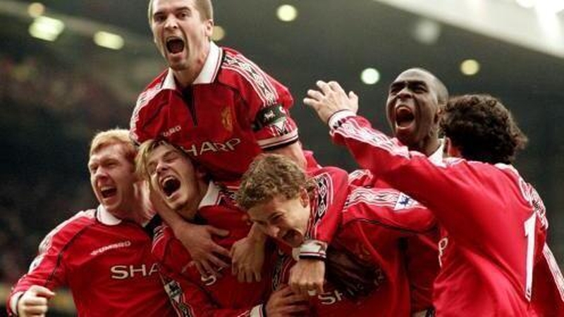 Solskjaer with his team-mates after scoring that winning goal 22 years ago