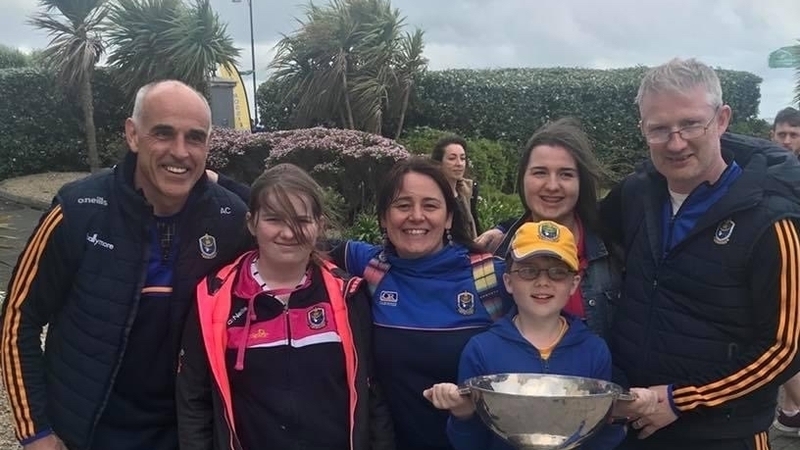 Rebecca Osgood Daly (second from the left) with her family and the Roscommon football manager Anthony Cunningham