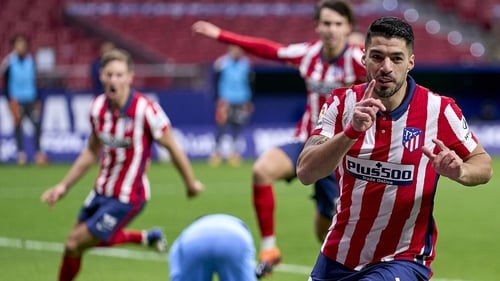Luis Suarez scored his 12th league goal of the season as Atletico Madrid overhauled Valencia