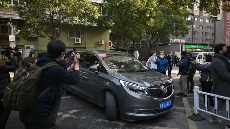 Members of the World Health Organization team arrive at Xinhua Hospital in Wuhan