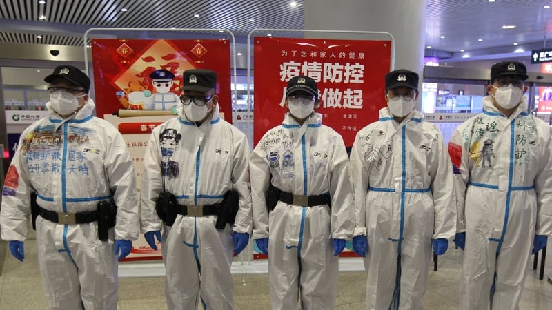 Police officers stand guard at Shijiazhuang Railway Station on the first day of the Spring Festival travel rush