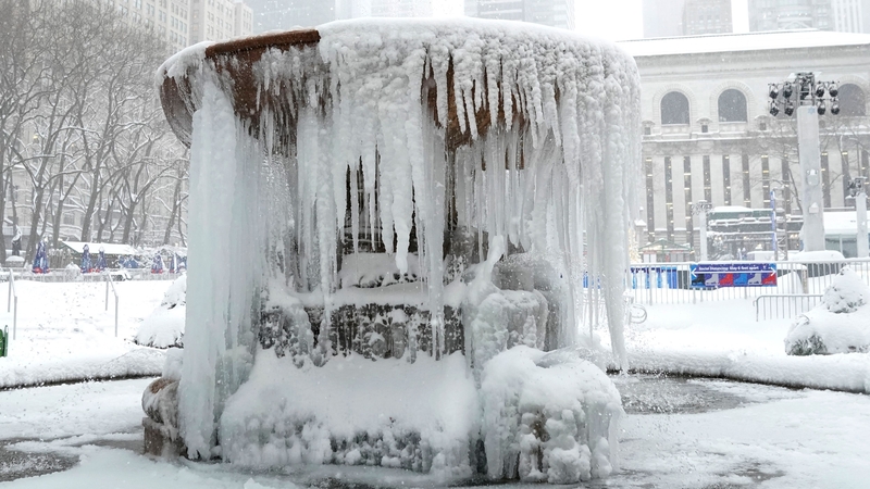 The Josephine Shaw Lowell Memorial Fountain is completely frozen over in Bryant Park, NYC