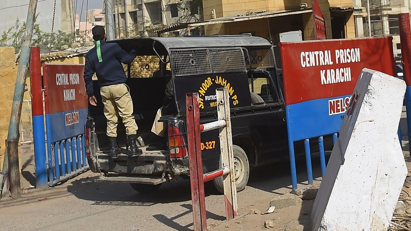A police vehicle enters the central prison Ahmed Omar Saeed Sheikh is serving his jail sentence