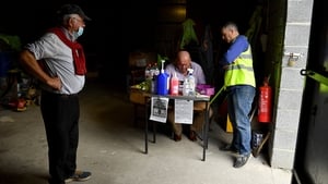 Explosion on the airwaves. Cusack Park officials Michael Maher, left, John Meade and Fergie McDonagh tune in to Clare GAA TV to follow the live broadcast of the intermediate semi-final between Kildysart and Corofin at Doonbeg.
