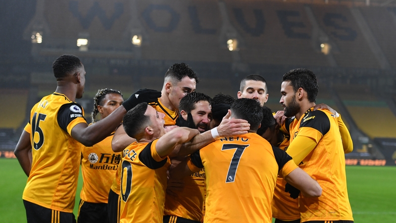 Joao Moutinho is mobbed after is fine strike