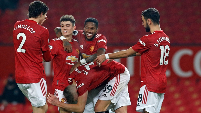 Manchester United mob Scott McTominay after his goal