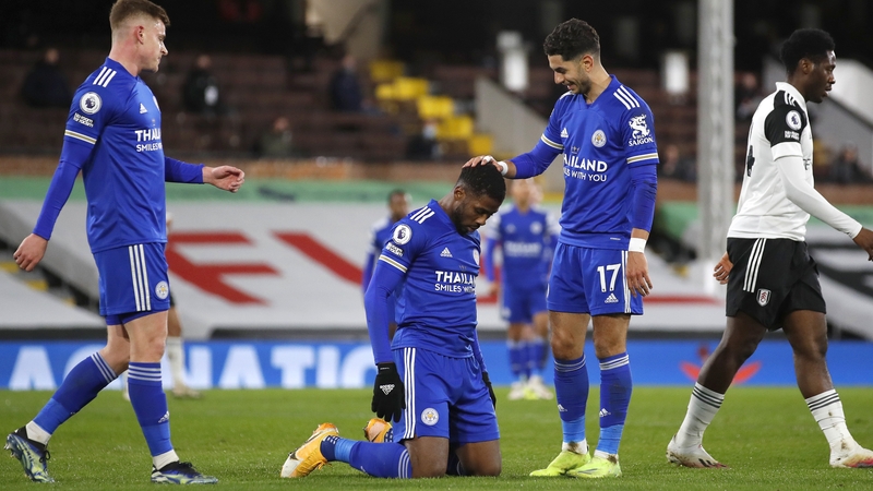 Kelechi Iheanacho gets a pat on the head from Ayoze Perez after giving Leicester the lead