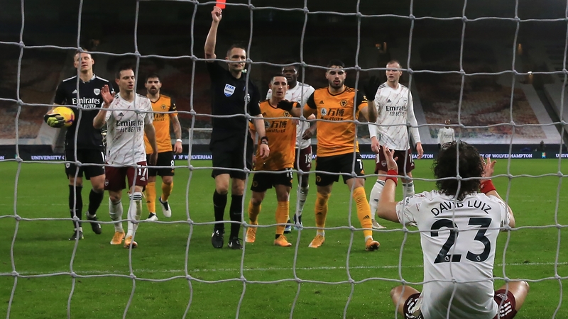 David Luiz (R) is shown the red card