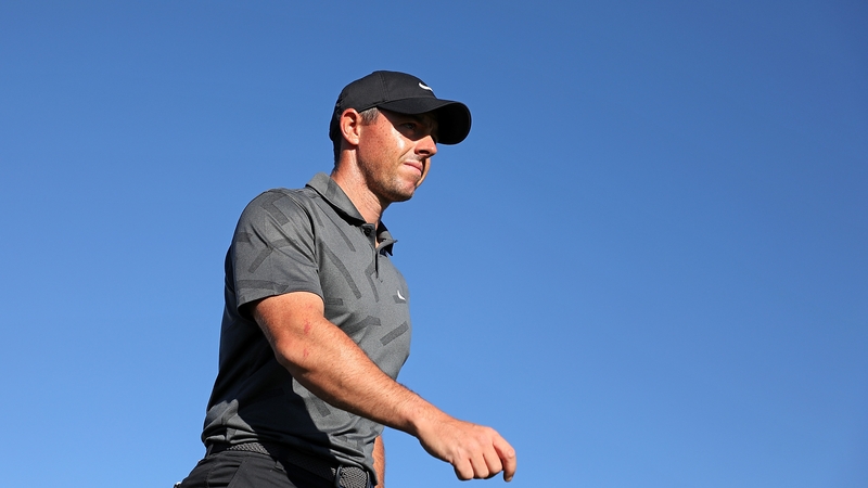 Rory McIlroy walks to the 10th tee