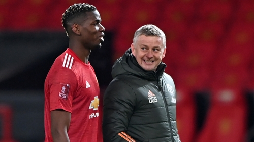 Ole Gunnar Solskjaer (R) with Paul Pogba