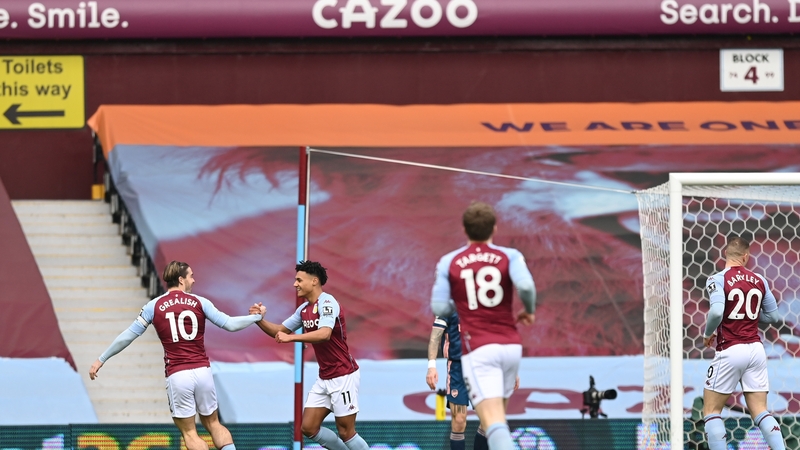 Ollie Watkins celebrates with Jack Grealish after scoring