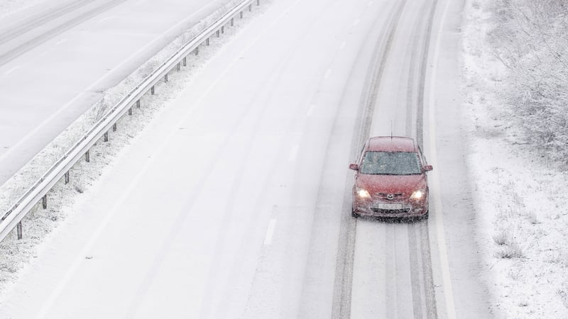 Snow falls on the A14 near Ipswich in Suffolk in the UK today