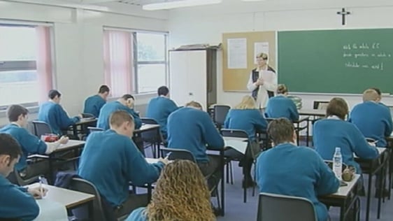Secondary school students and teacher in classroom (2001)