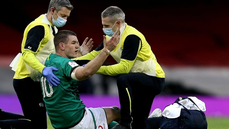 Johnny Sexton is attended to by the Irish rugby medical team at Cardiff