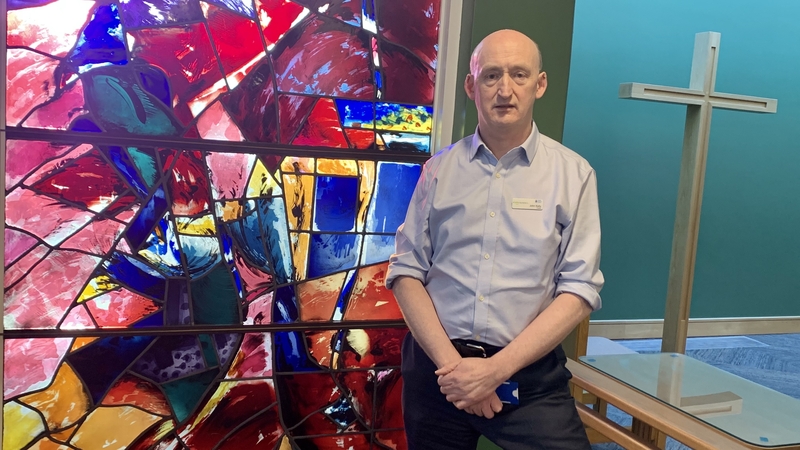 Chaplain John Kelly says he offers a supportive listening ear for patients