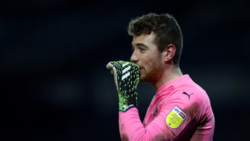 Travers in action for Swindon against Portsmouth on 9 February