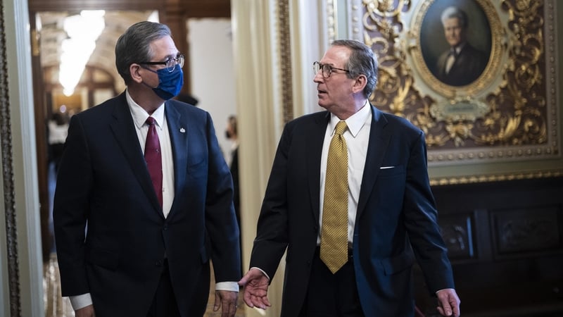 Bruce Castor and Michael van der Veen, lawyers for former President Donald Trump, walk during a break in proceedings