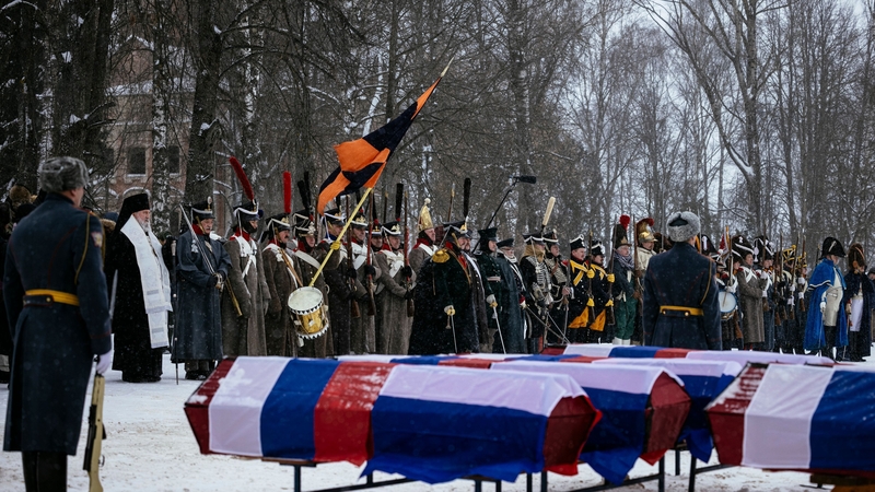 The caskets contained the remains of 120 soldiers, three women and three teenagers