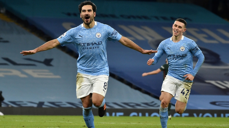Ilkay Gundogan celebrates after wrapping up Manchester City's victory over Spurs