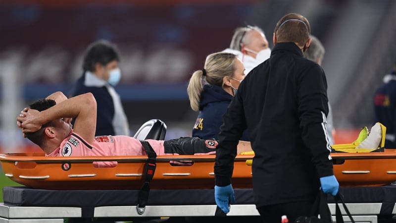 John Egan leaves the field of play at the London Stadium