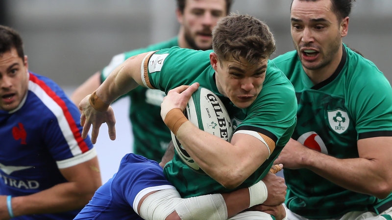 Garry Ringrose is tackled by France's centre Gael Fickou